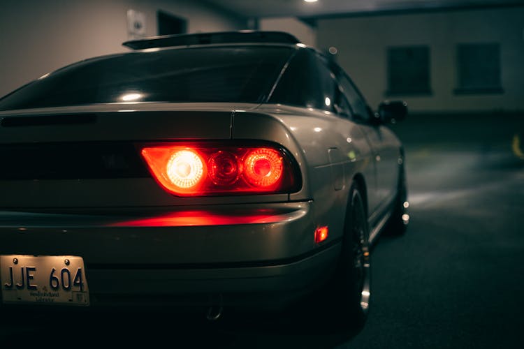 A Car Driving Inside A Parking Building