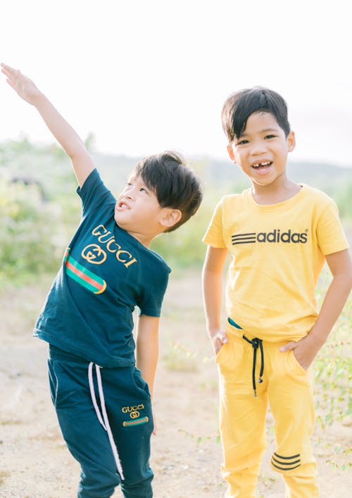 Free Young Boys Wearing T-shirts and Jogging Pants Stock Photo