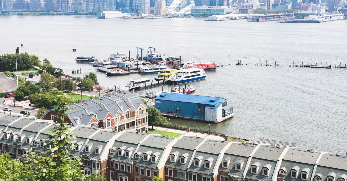 Aerial view of Edgewater, NJ overlooking the waterfront and Manhattan skyline.