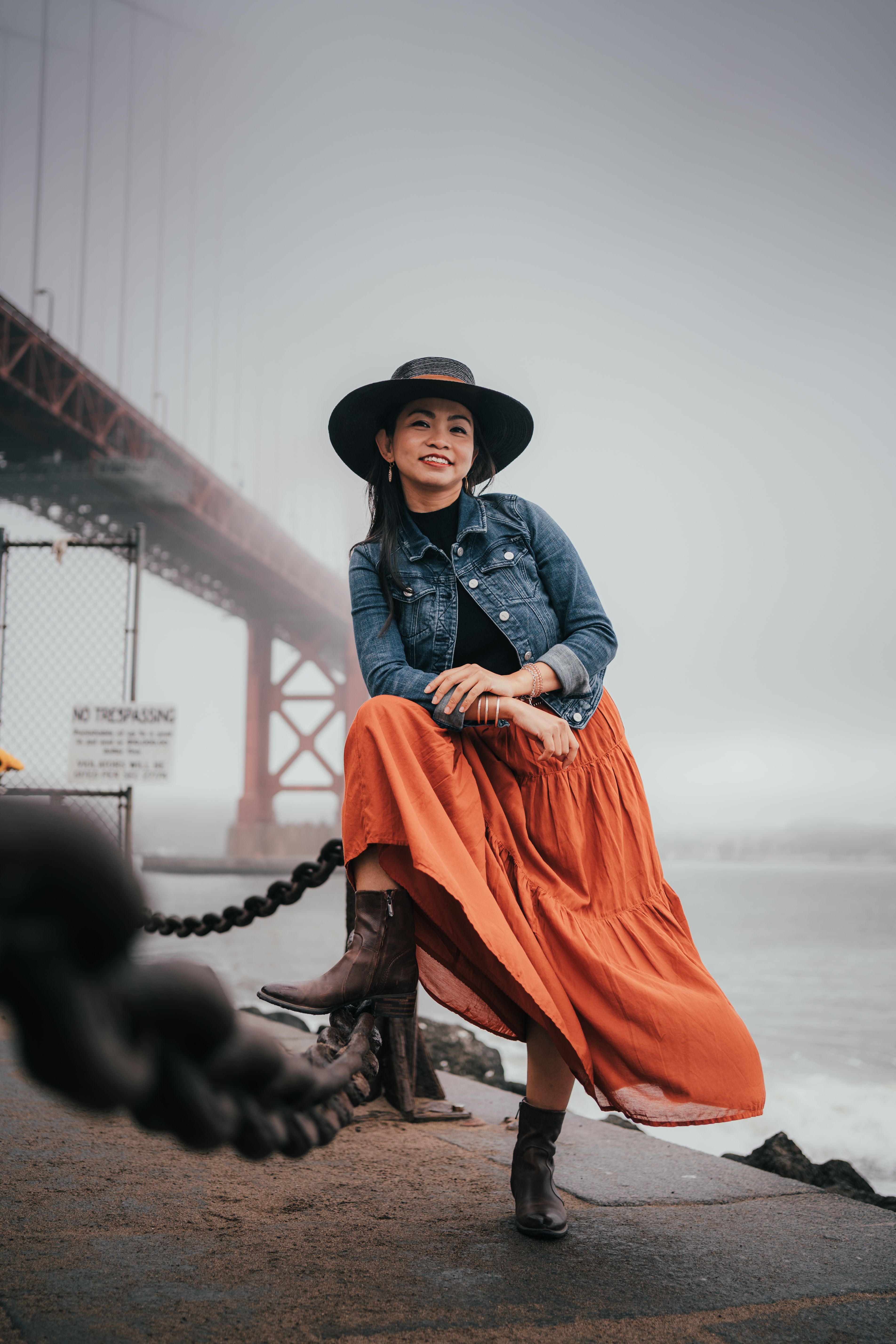 orange dress with denim jacket Young Woman Wearing an Orange Dress and a Denim Jacket  Free Stock Photo