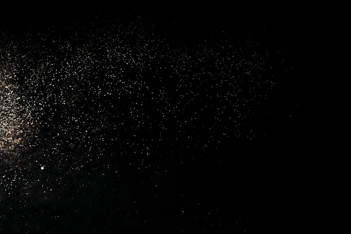 White Dust Particles on Black Background · Free Stock Photo