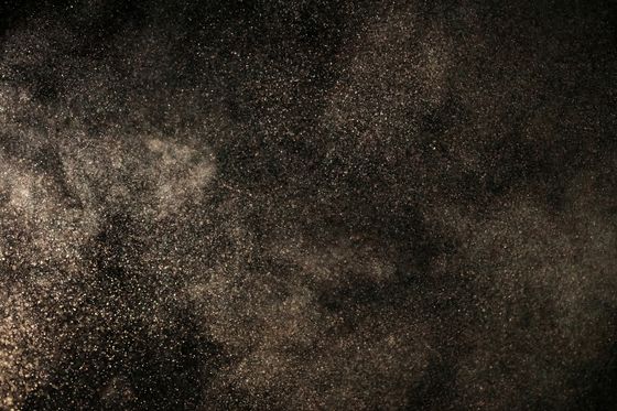 Dust suspended in a dark beam by cottonbro studio on Pexels
