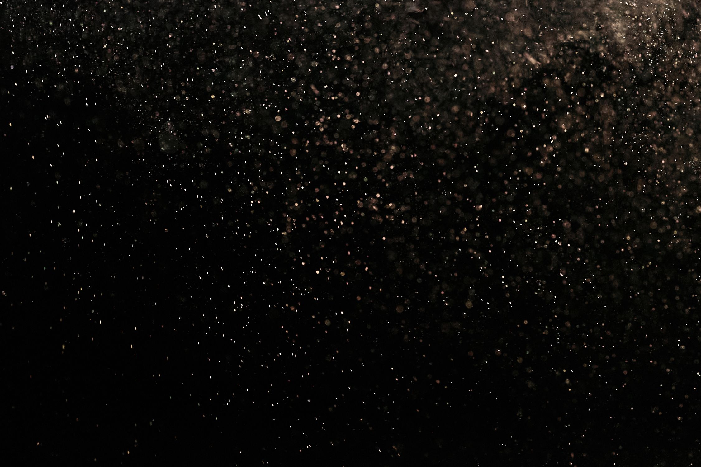 White Dust Particles on Black Background · Free Stock Photo