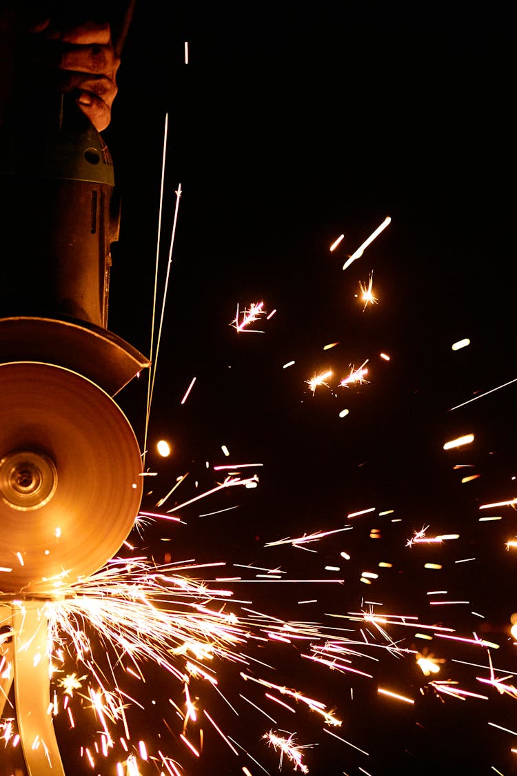 Flashing Sparks Coming From The Angle Grinder