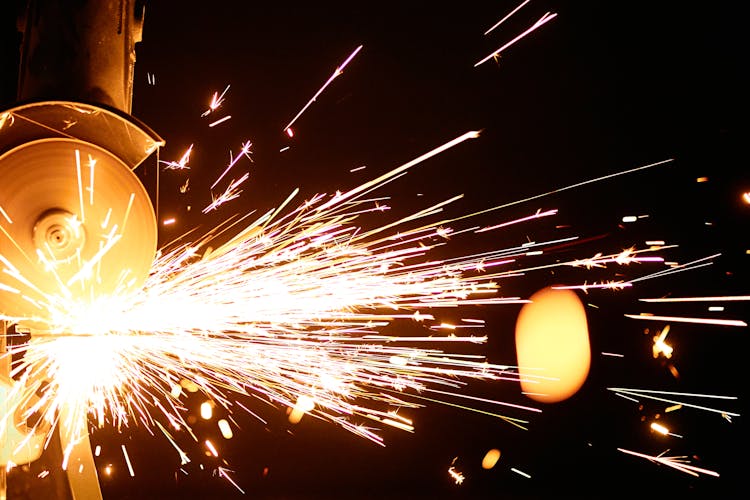 Flashing Sparks Coming From The Angle Grinder