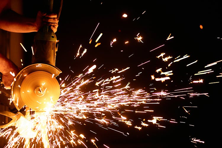 Flashing Sparks Coming From The Angle Grinder