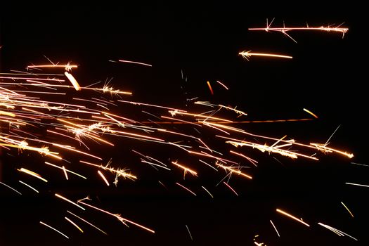 Close-Up Photo of Flashing Sparks on Black Background