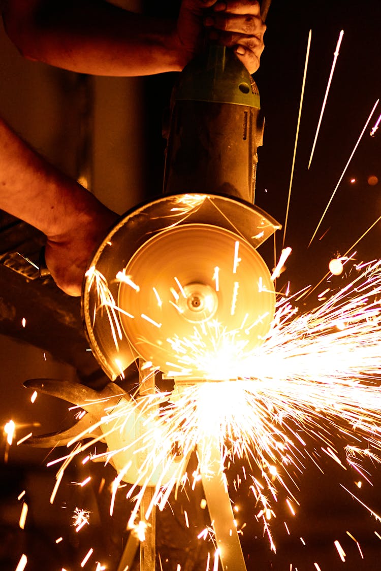 Flashing Sparks Coming From The Angle Grinder