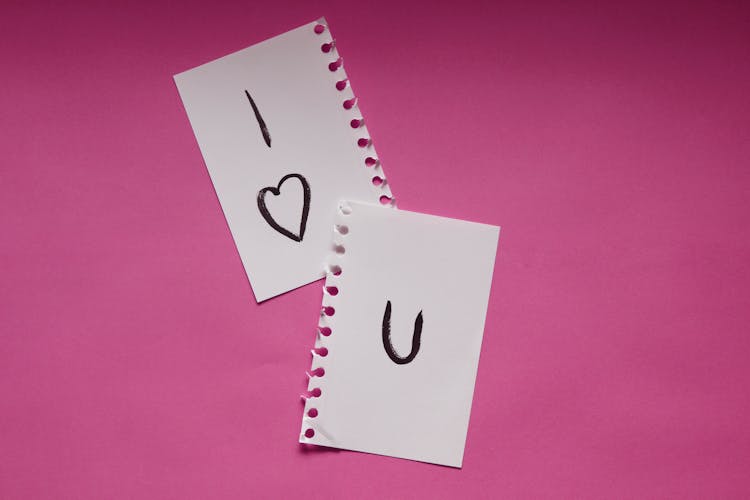 Torn Notebook Pages With I Love You Message On Pink Background