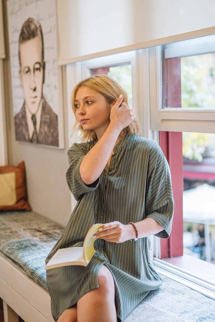 Woman Sitting With Book Near Man Portrait