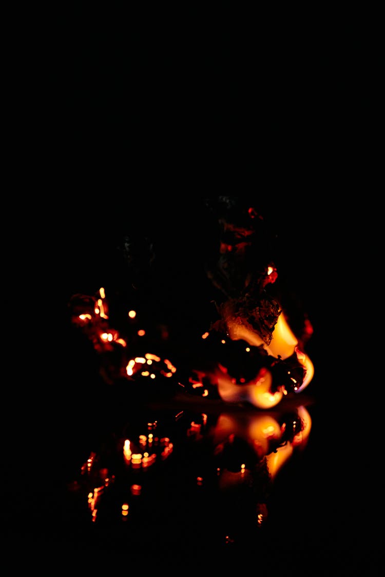 Fading Flame On Black Background