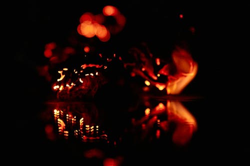 Unfocused blur orange lights on black background 