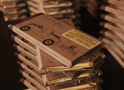 Close Up Photo of Stacks of Chocolate Bars