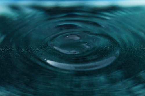 Free Ripples on the Surface of the Water Stock Photo