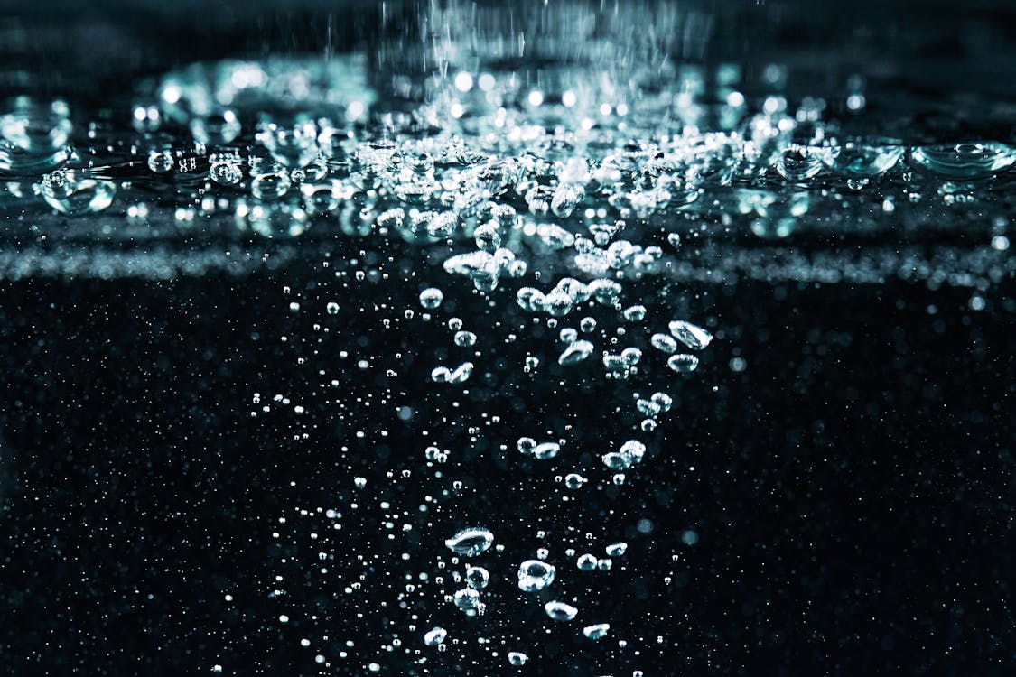 Macro Photography of Bubbles in Water