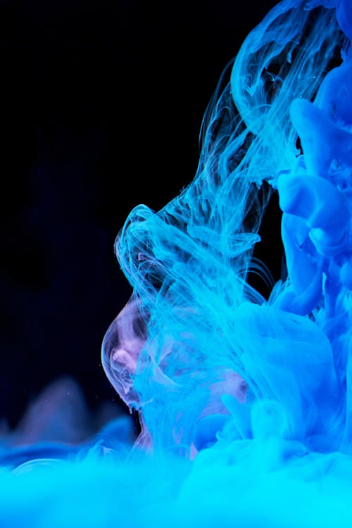 Fotografia Em Alta Velocidade De Difusão De Tinta Azul Na água