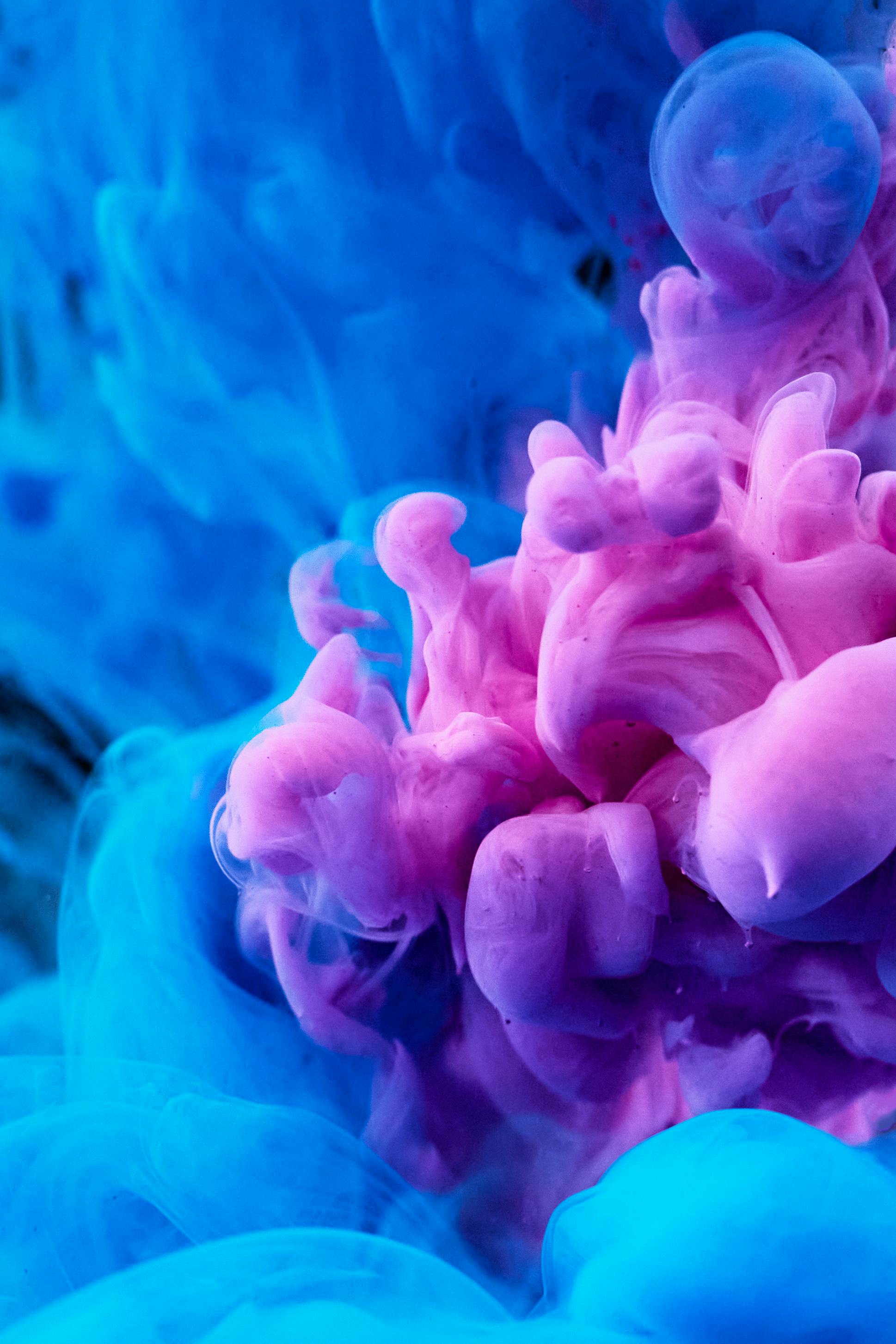 high speed photography of colorful ink diffusion in water