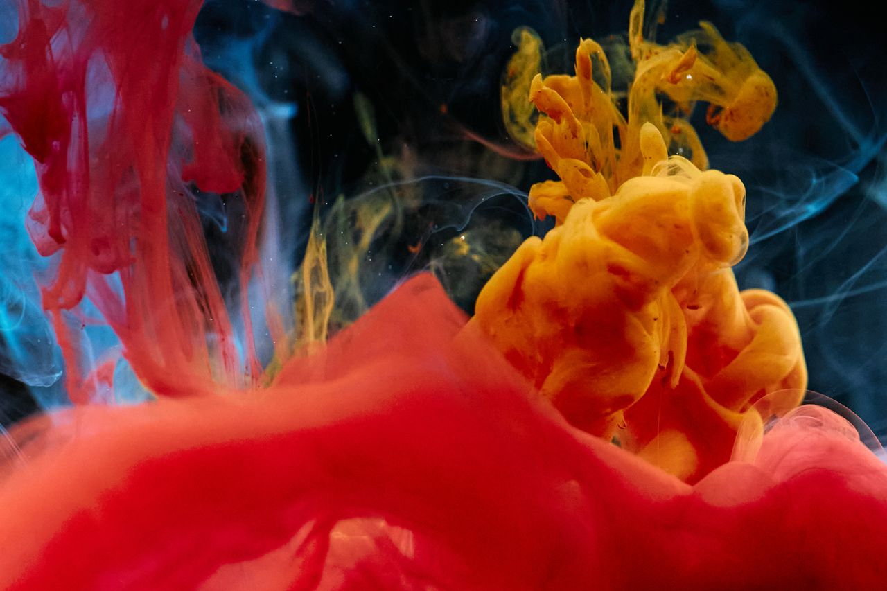 colorful abstract image of ink swirling in water capturing vivid hues