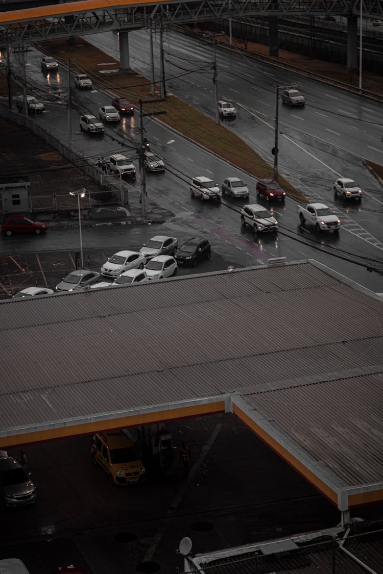 Cars Traveling On Concrete Road