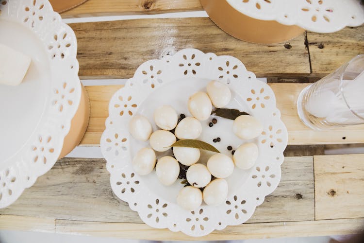 Hard Boiled Egss On A White Ceramic Plate