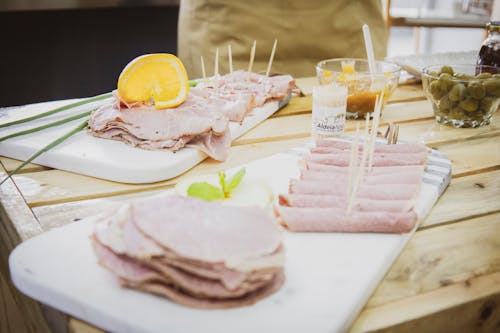Close Up Photo of Sliced Ham in White Tray 