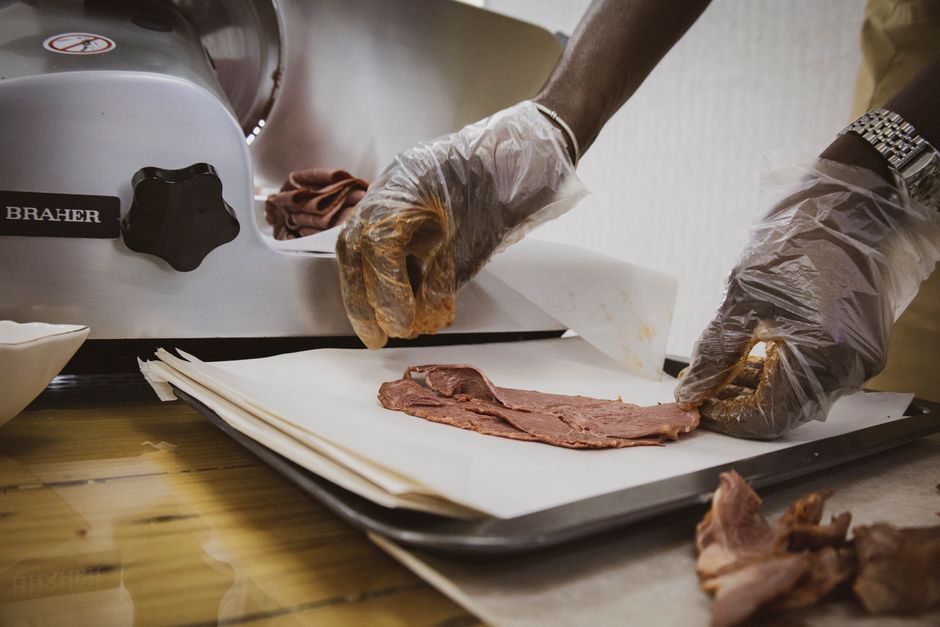 Fresh deli meat sliced to order at the counter
