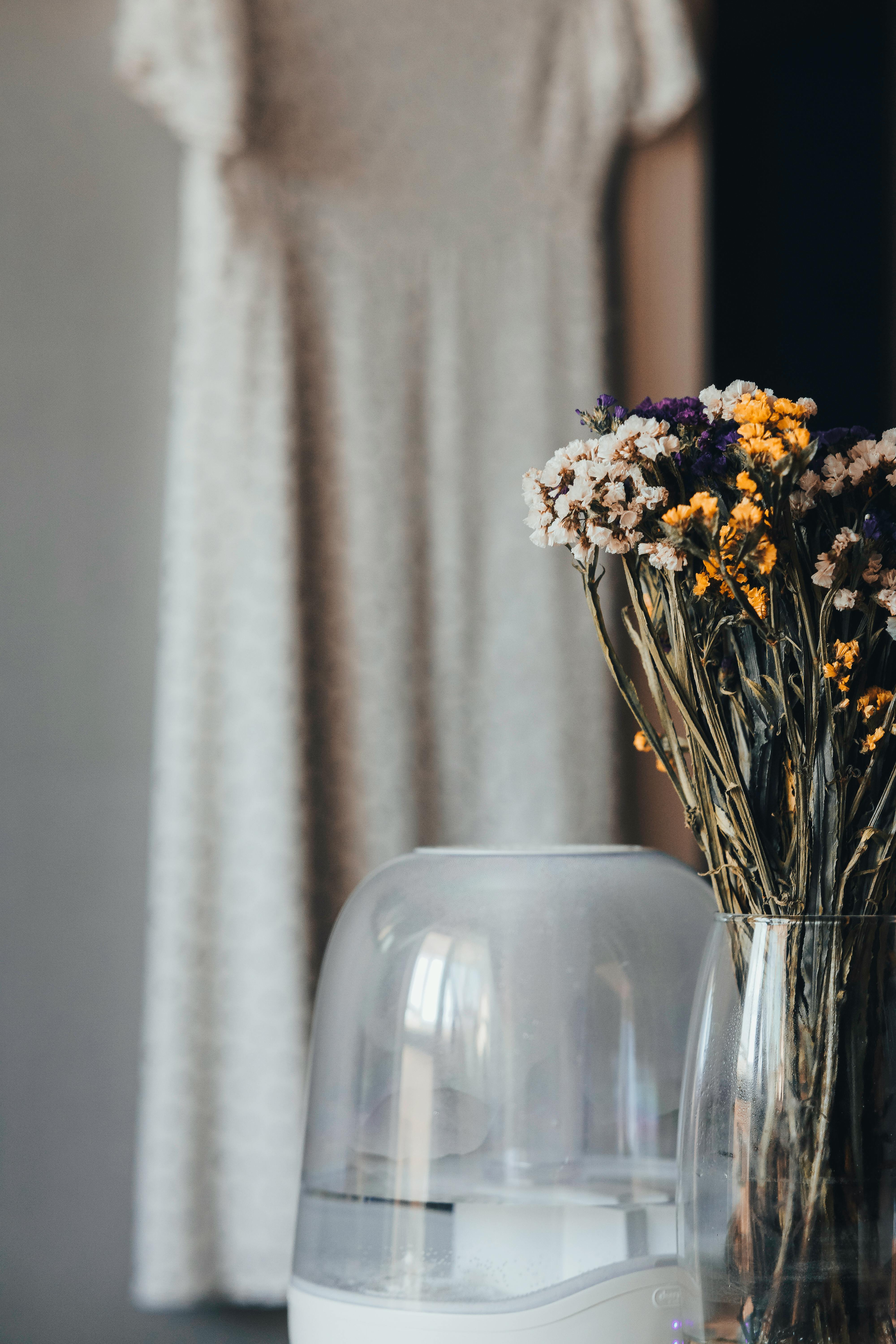 White Flowers in Blue Glass Vase · Free Stock Photo
