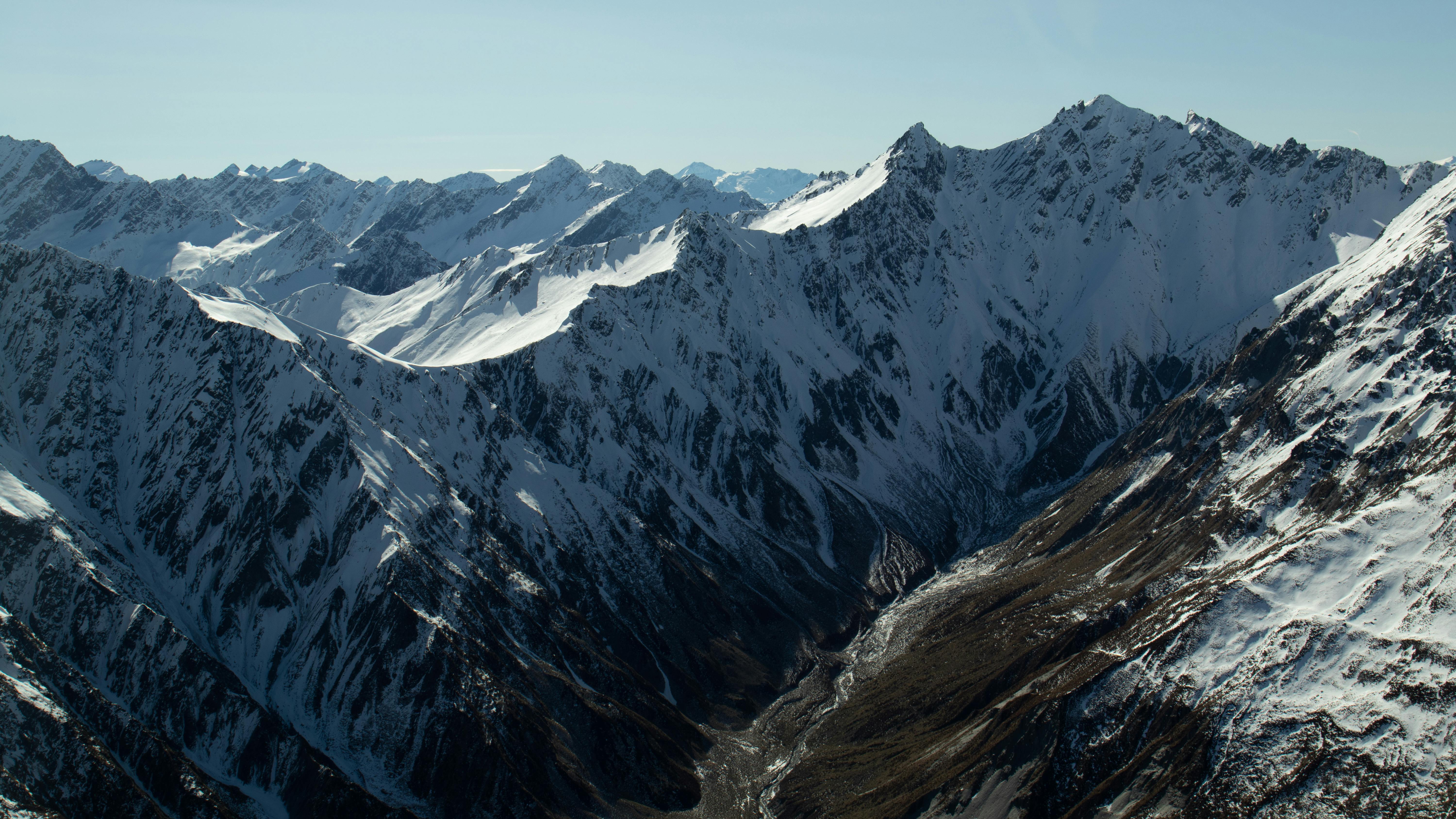 Stunning aerial view of snow-covered mountains in Canterbury, New Zealand.