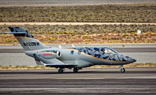 Free HondaJet N420NW on a runway in Reno, NV highlighting its modern design. Stock Photo