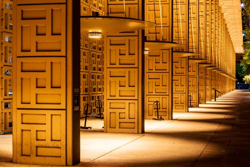 Free A striking view of an illuminated facade at Stanford University showcasing modern architecture. Stock Photo