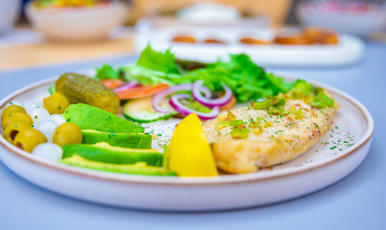 Close Up Photo of Cooked Dish on White Ceramic Plate