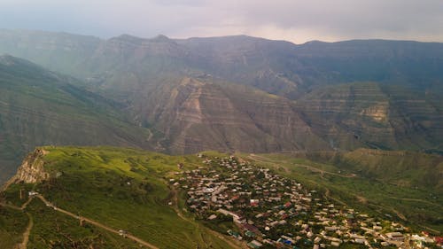 Бесплатное стоковое фото с величественный, горы, деревня