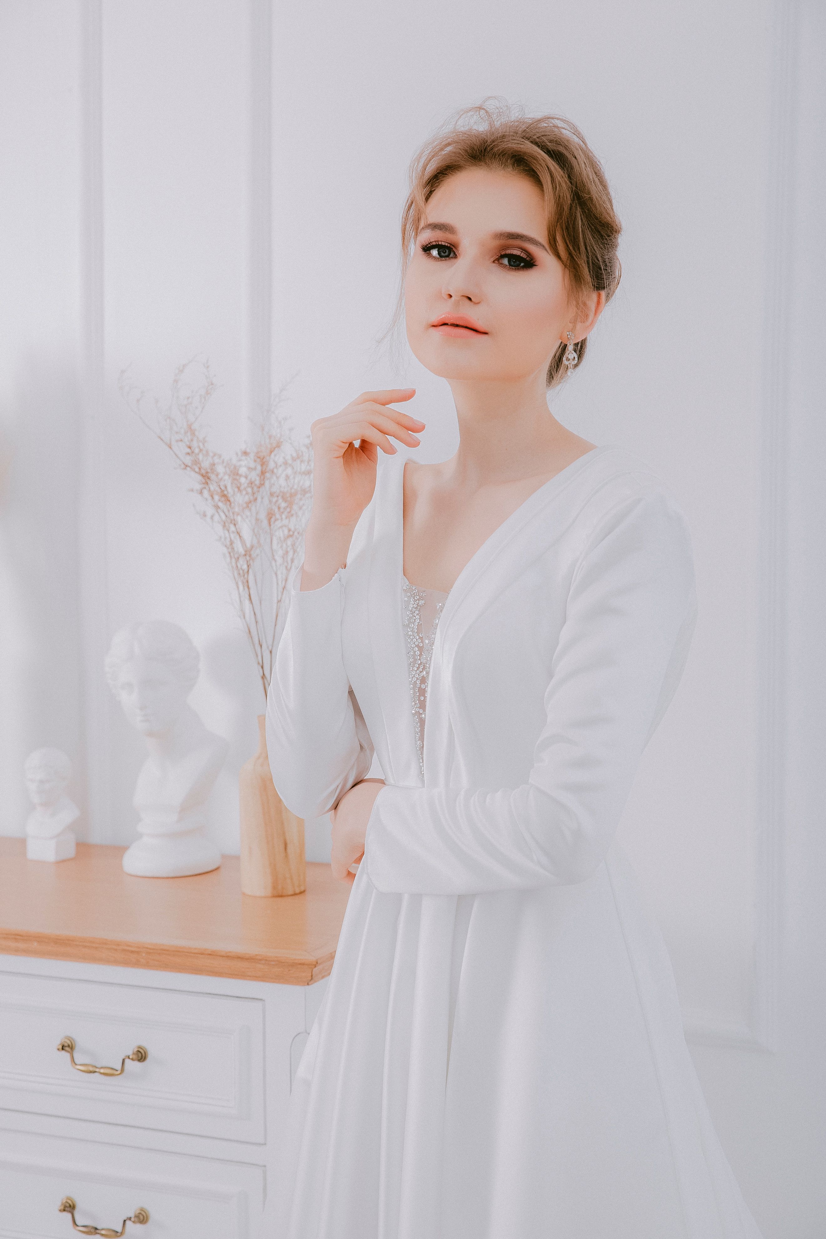 A Woman in White Long Sleeve Dress · Free Stock Photo