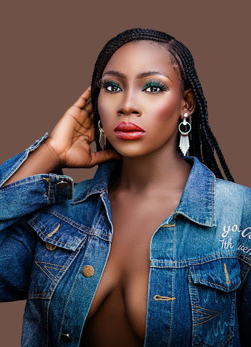 Free Woman in an Unbuttoned Blue Denim Jacket Stock Photo