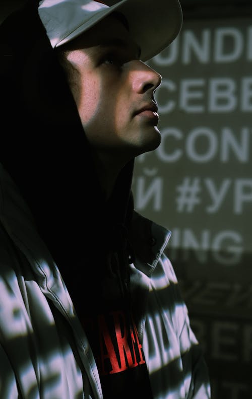 Close Up Photo of Man in Black Hoodie