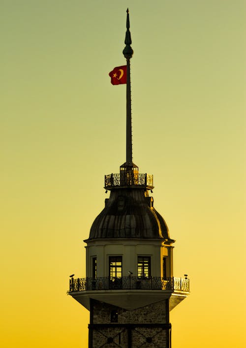 Maidens Tower in Istanbul, Turkey on Yellow Background