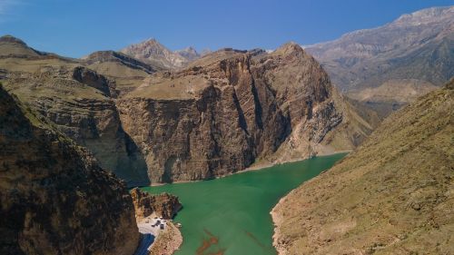 Free Explore the breathtaking canyon and emerald waters in Dagestan, Russia. A natural wonder for travel and adventure lovers. Stock Photo