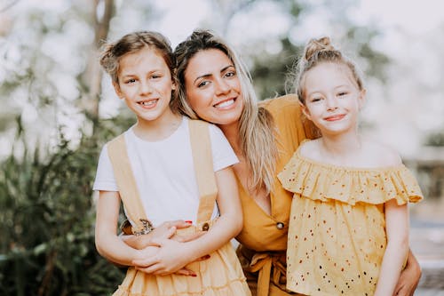 Mother and 2 girls posing