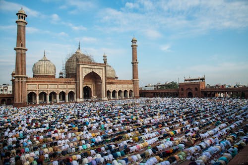 Free People Praying outside of the Jama Masjid, Delhi Stock Photo