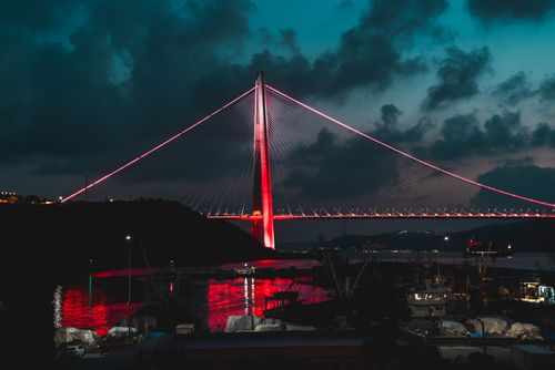 Free Illuminated Yavuz Sultan Selim Bridge at night over the Bosphorus Strait in Istanbul, Turkey. Stock Photo