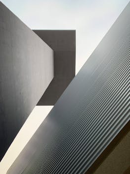 Dynamic angles of a modern building with a futuristic feel at Schiphol Airport, Netherlands.