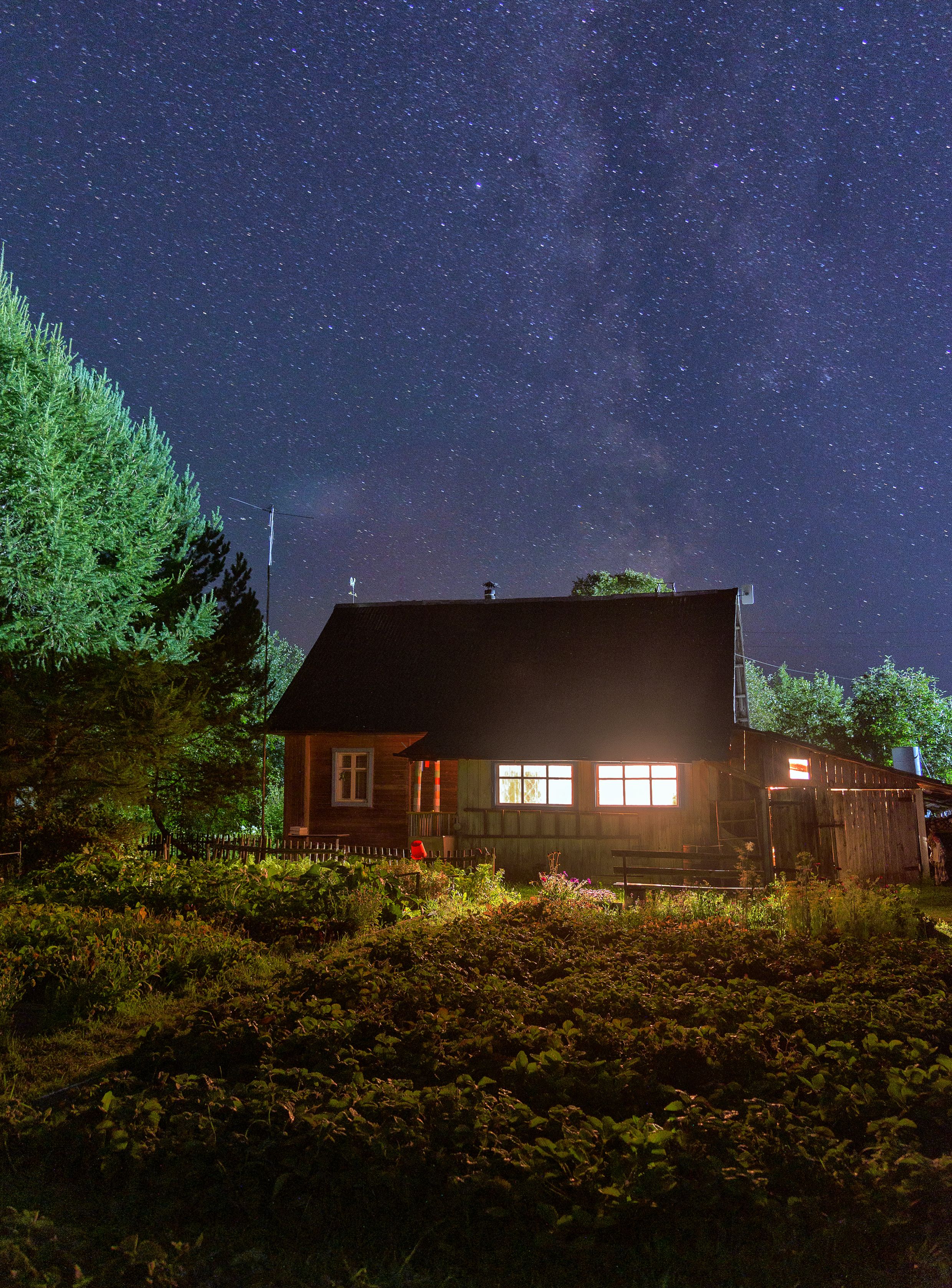 Photo of Lighted House Under Starry Night Sky · Free Stock Photo