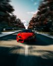 Red Ferrari Car on Road