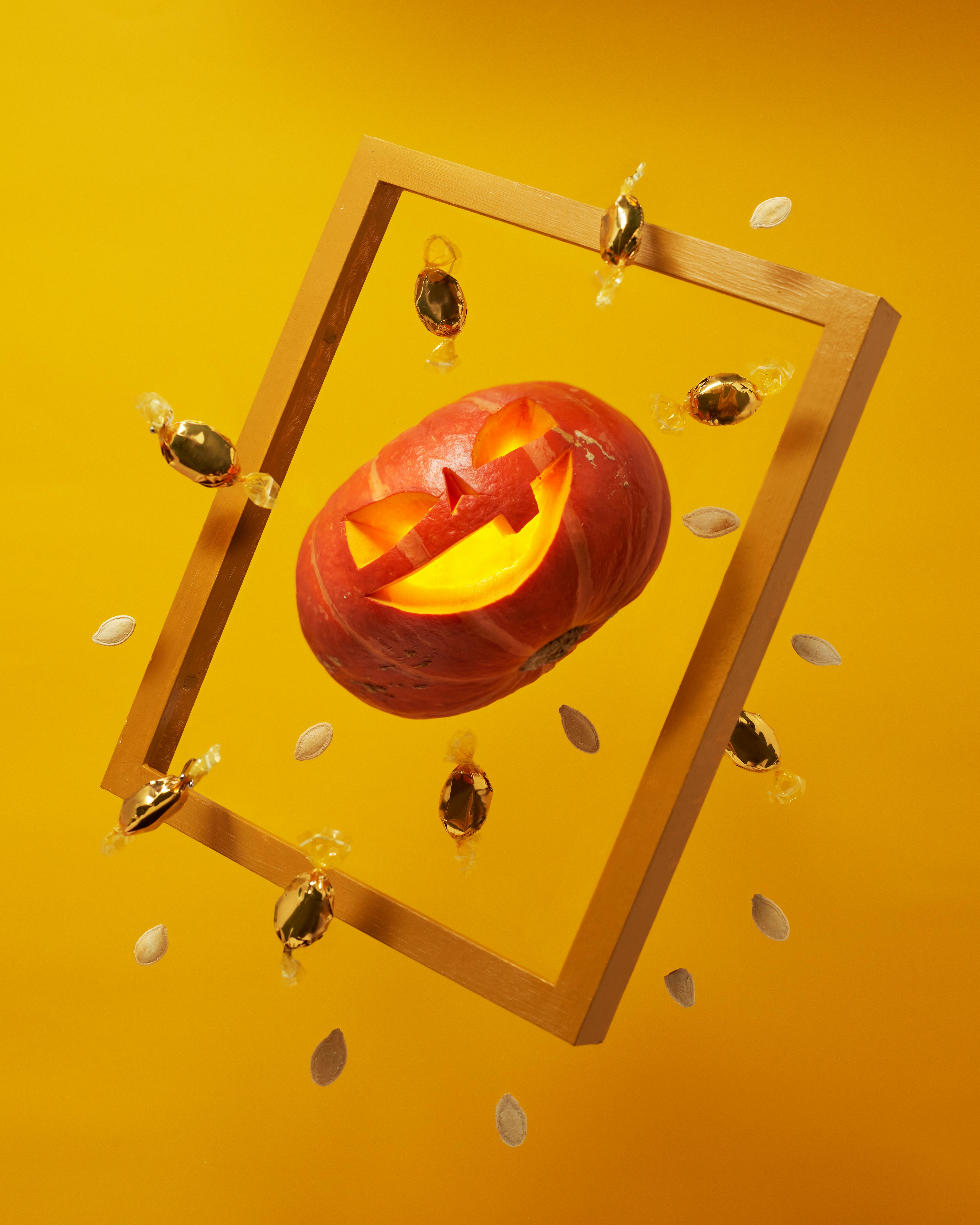 Orange Pumpkin o Yellow Background · Free Stock Photo