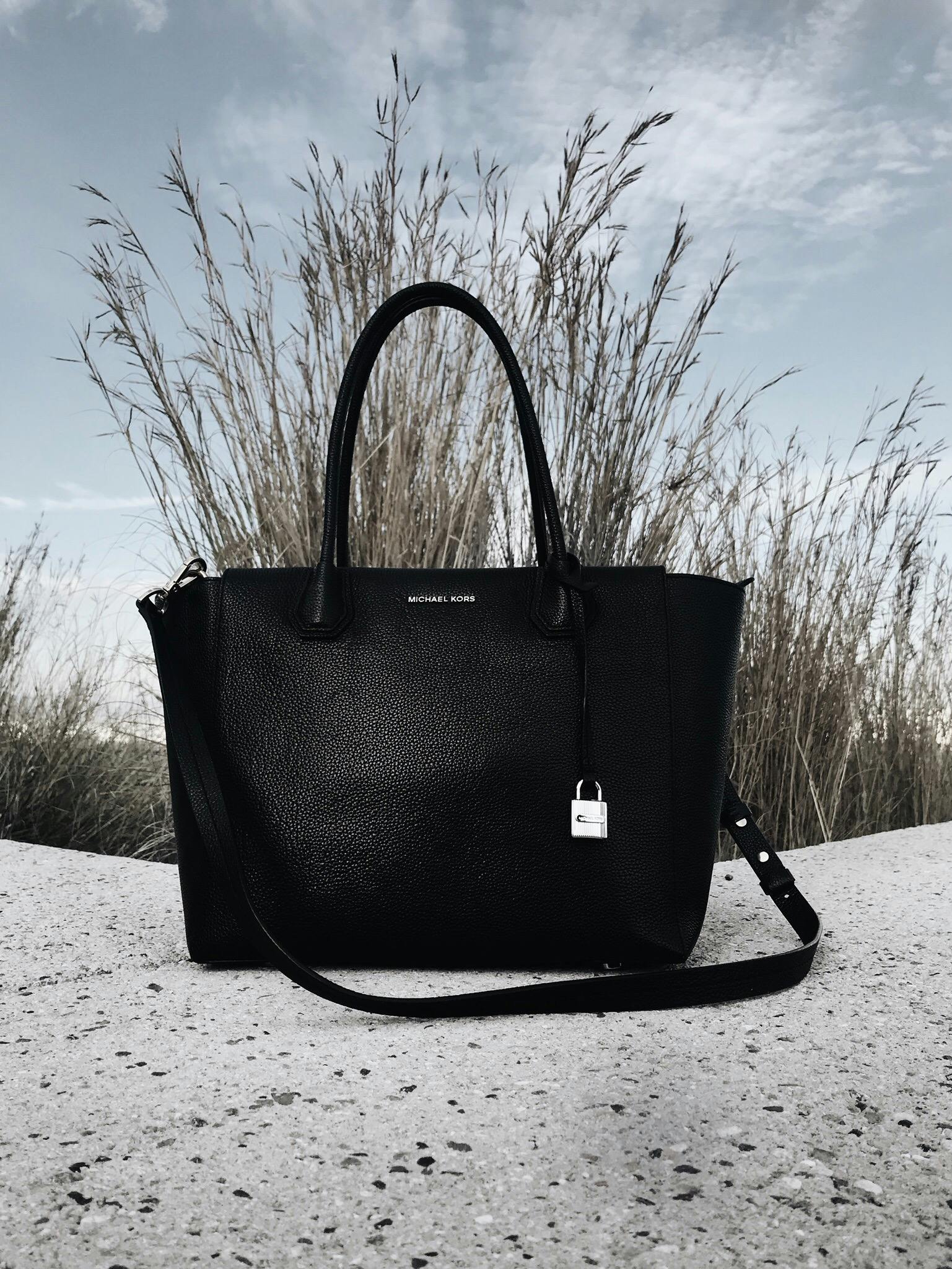 Black Michael Kors Leather 2-way Bag on Gray Surface