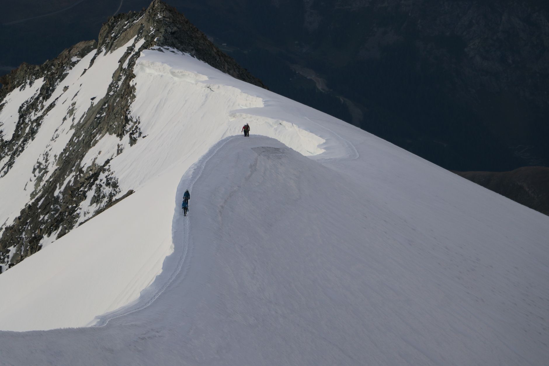 mountaineer climbing alpine snow