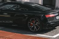 Black Car on Black and Red Road