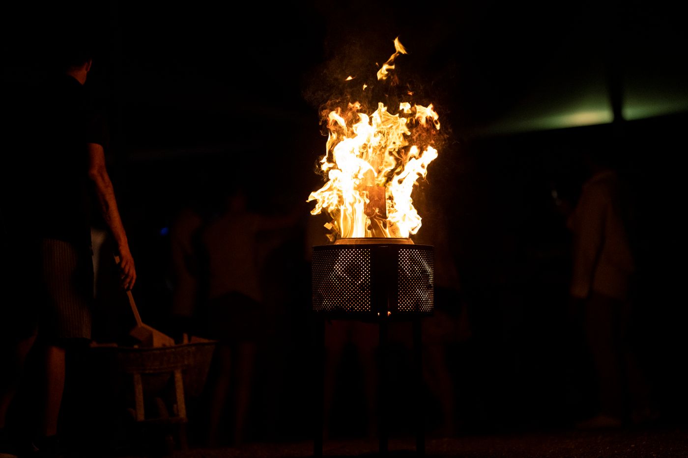 People enjoying a warm bonfire night