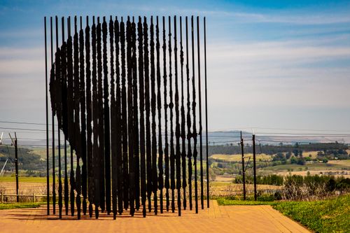 Free Nelson Mandela sculpture at his capture site, a landmark tourist attraction in South Africa. Stock Photo
