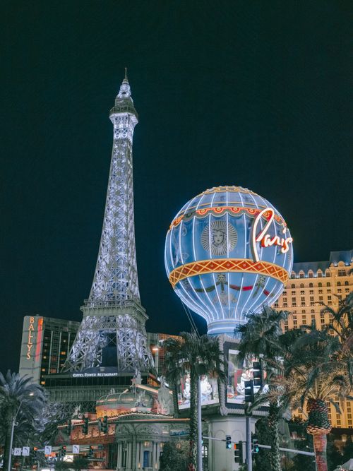Free Captivating night scene of Paris Las Vegas with the Eiffel Tower and illuminated balloon. Stock Photo